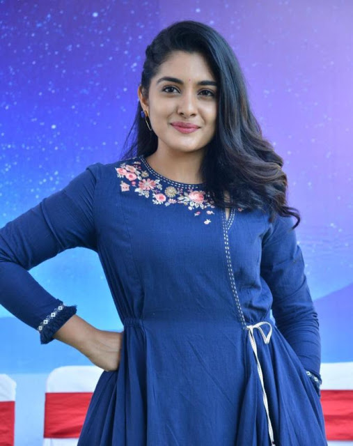 Nivetha Thomas Stills In Blue Dress At Tamil Movie Opening 1