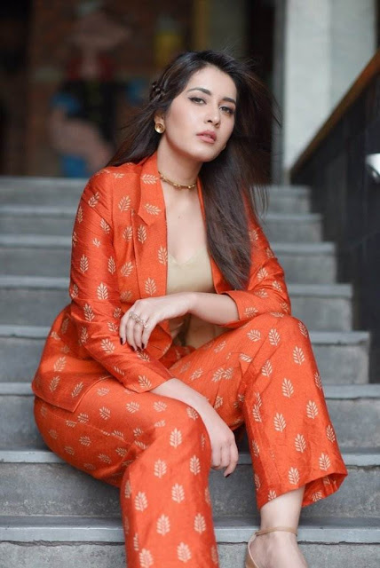 Raashi Khanna latest Photo Shoot In Long Hair Orange Dress 77