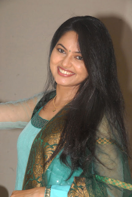 Telugu TV Actress Suhasini Long Hair Stills In Green Dress 36