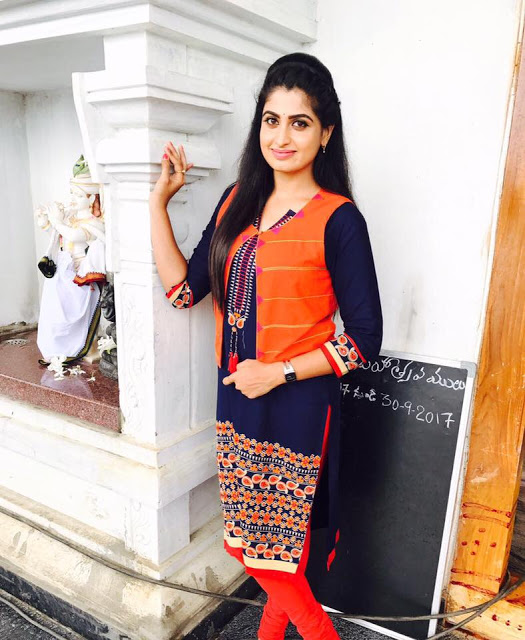 Telugu Serial Actress Chaitra Rai Stills In Orange Dress 36