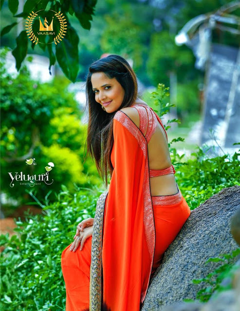 Gorgeous Indian TV Anchor Anasuya Hip Show In Orange Sari 86