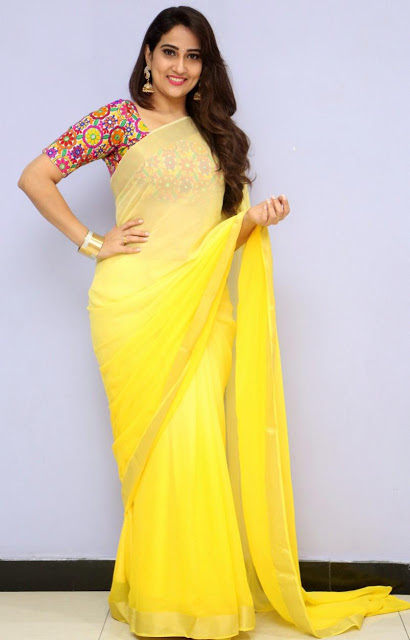 South Indian TV Actress Manjusha Stills In Traditional Yellow Saree 1